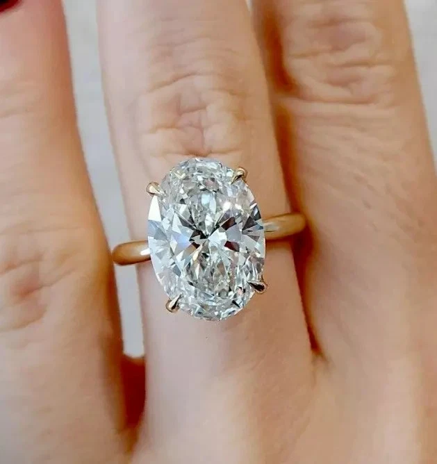 4.50CT Oval Cut Hidden Halo Lab Grown Diamond Engagement Ring In 14K Yellow Gold